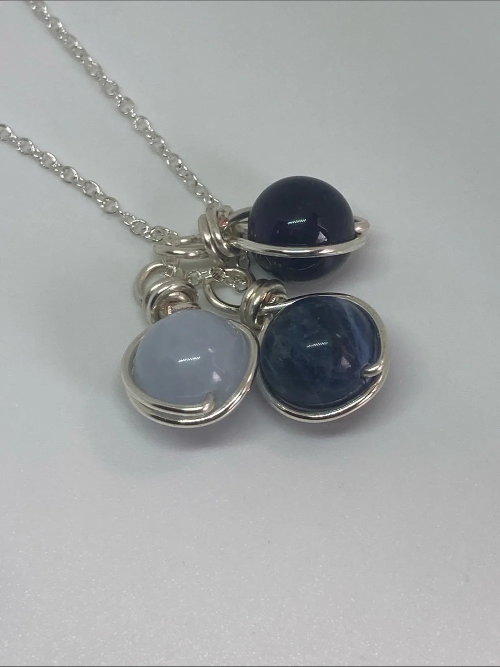 Silver necklace with amethyst, sodalite and aquamarine stone charms
